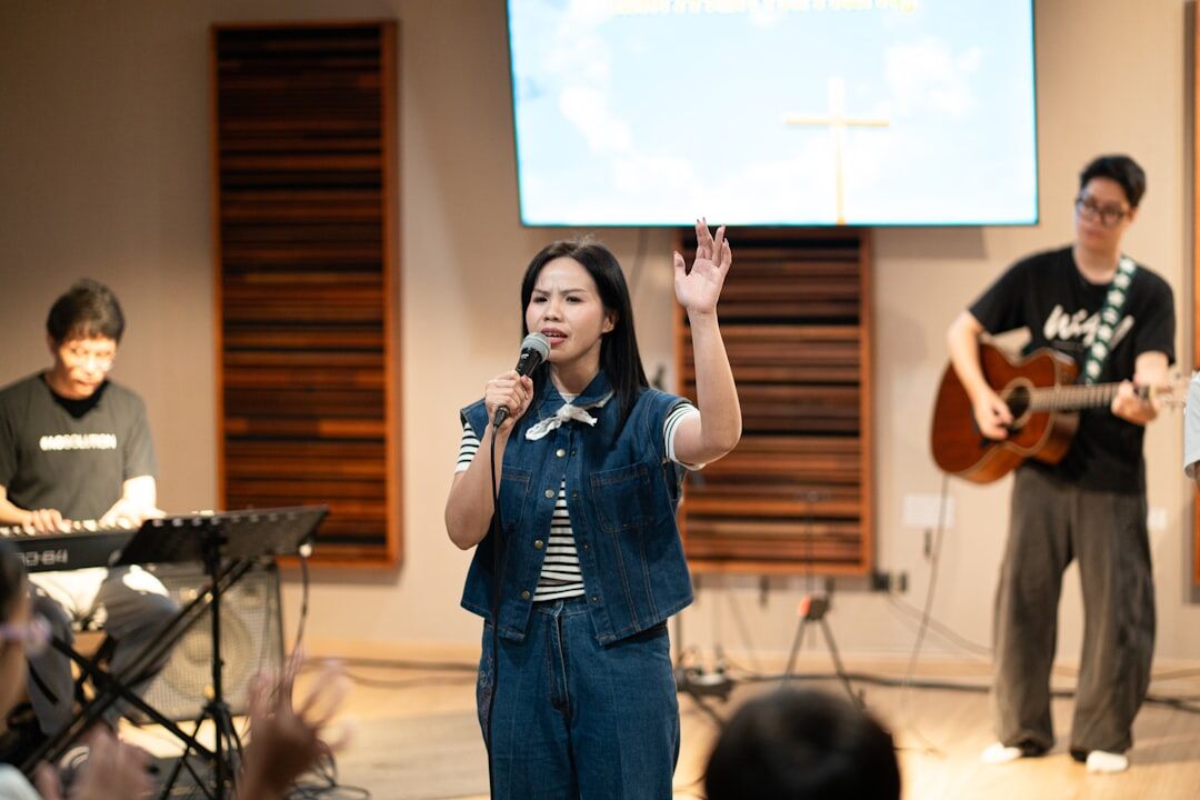 Woman speaking confidently to a group during a communication workshop
