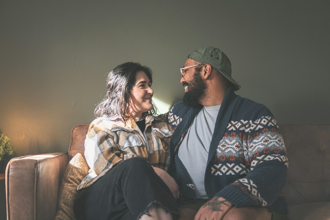 couple talking on couch